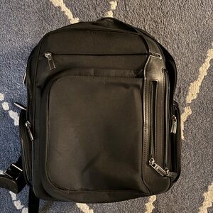 Tumi Kingsford Black Backpack with Silver Zippers
